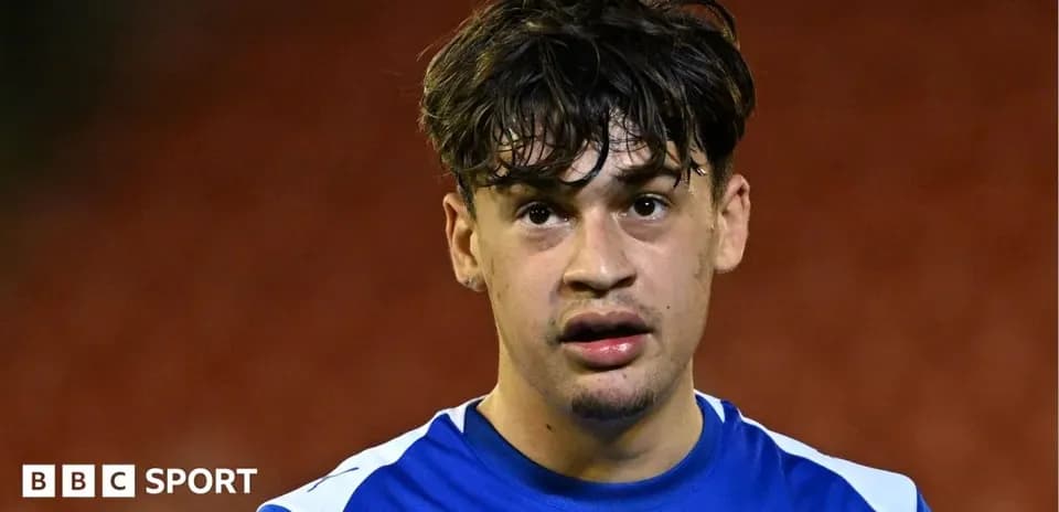 Football player in blue jersey after match
