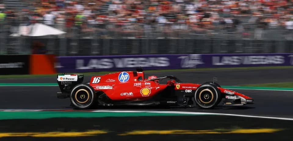 Ferrari F1 car racing on track during event