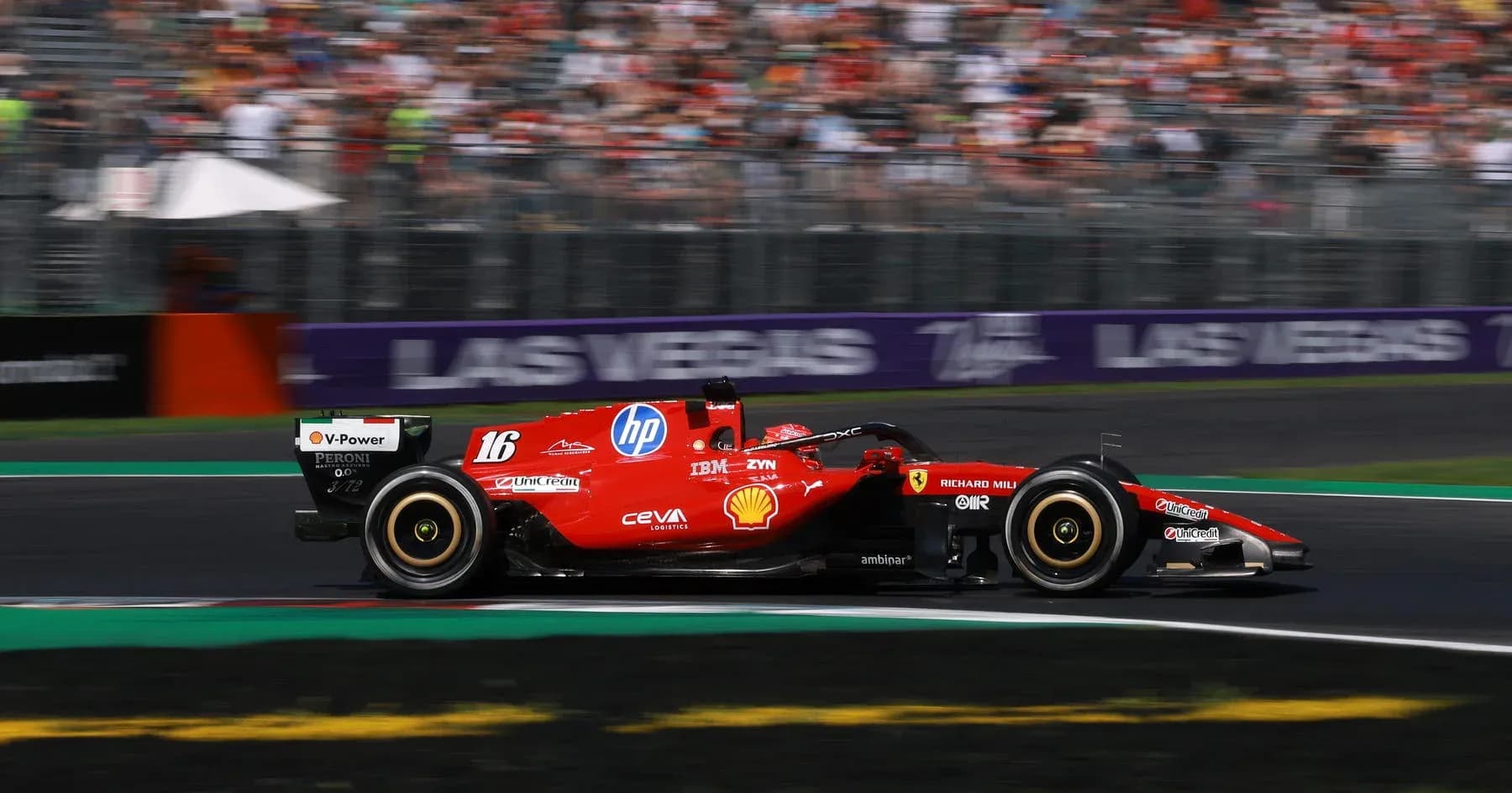 Ferrari F1 car racing on track during event