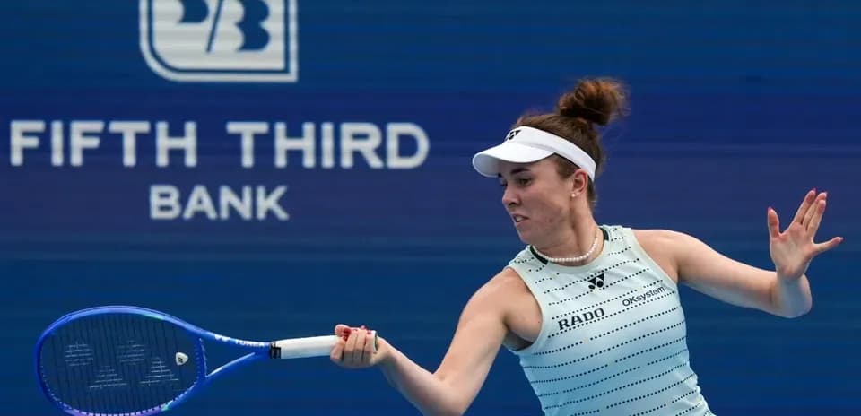 Player hitting a forehand during tennis match