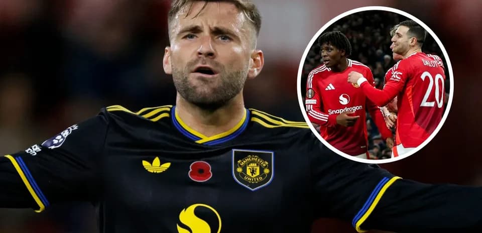 Luke Shaw gesturing during match with teammates celebrating