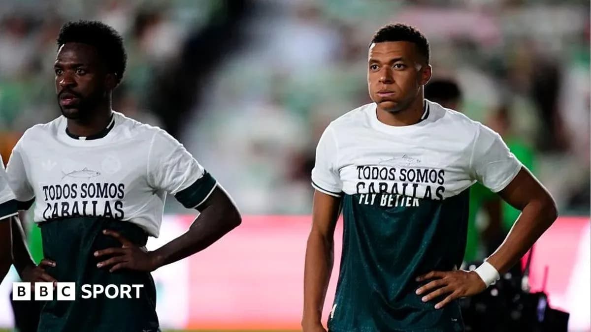 Players wearing warm-up shirts on the field