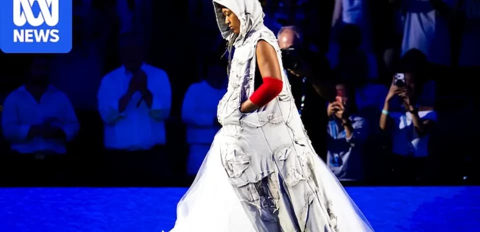 Athlete in unique outfit walking on stage