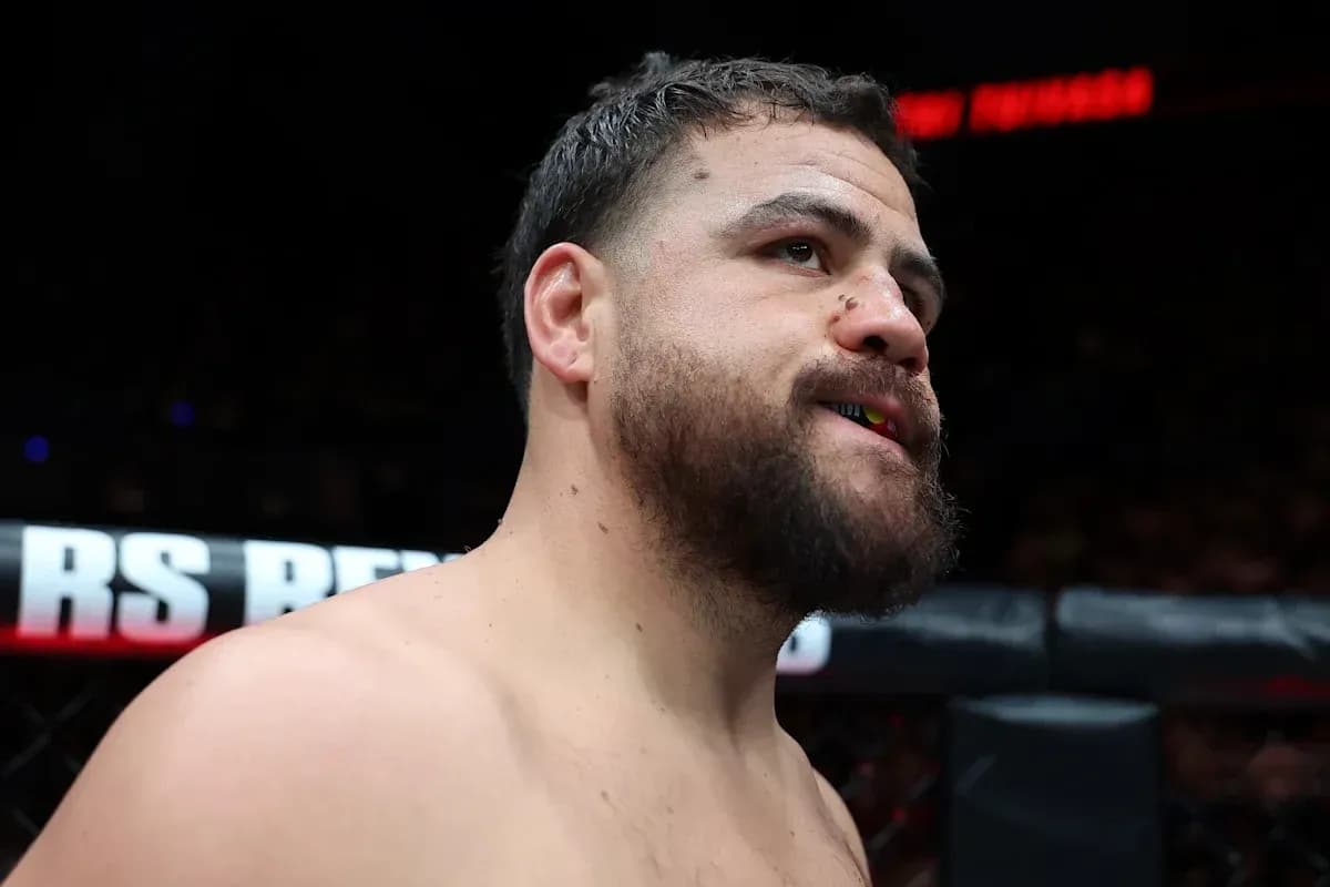 MMA fighter preparing in the ring before match