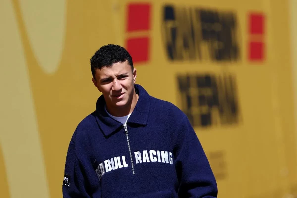 Driver wearing Red Bull Racing jacket at venue