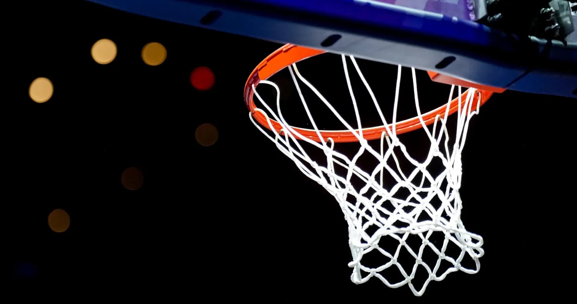 Basketball hoop against a dark background