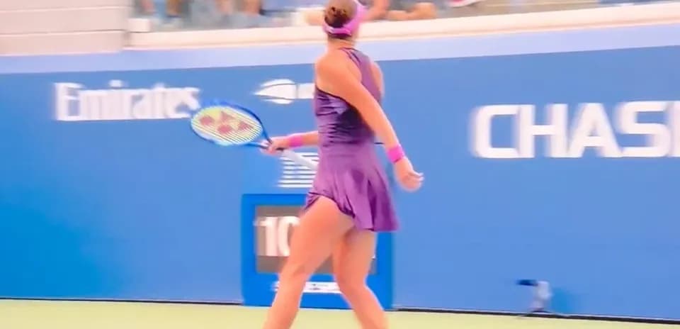 Female tennis player preparing to hit a shot