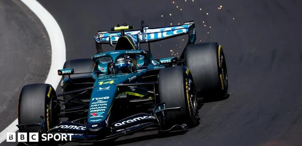 Race car driving on track with sparks flying