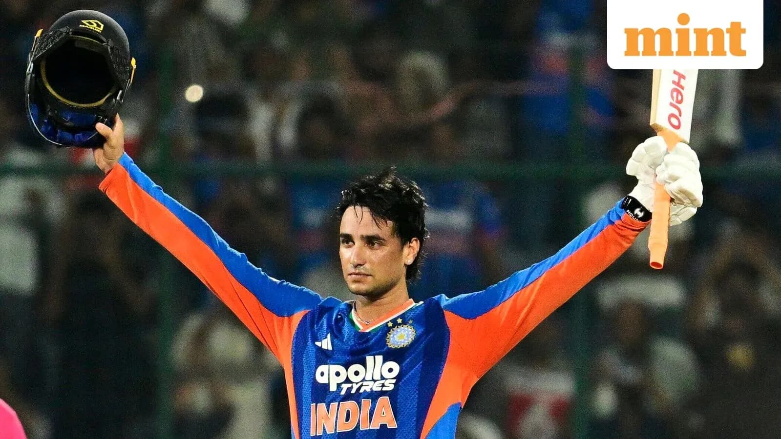 Cricketer celebrating after scoring a century