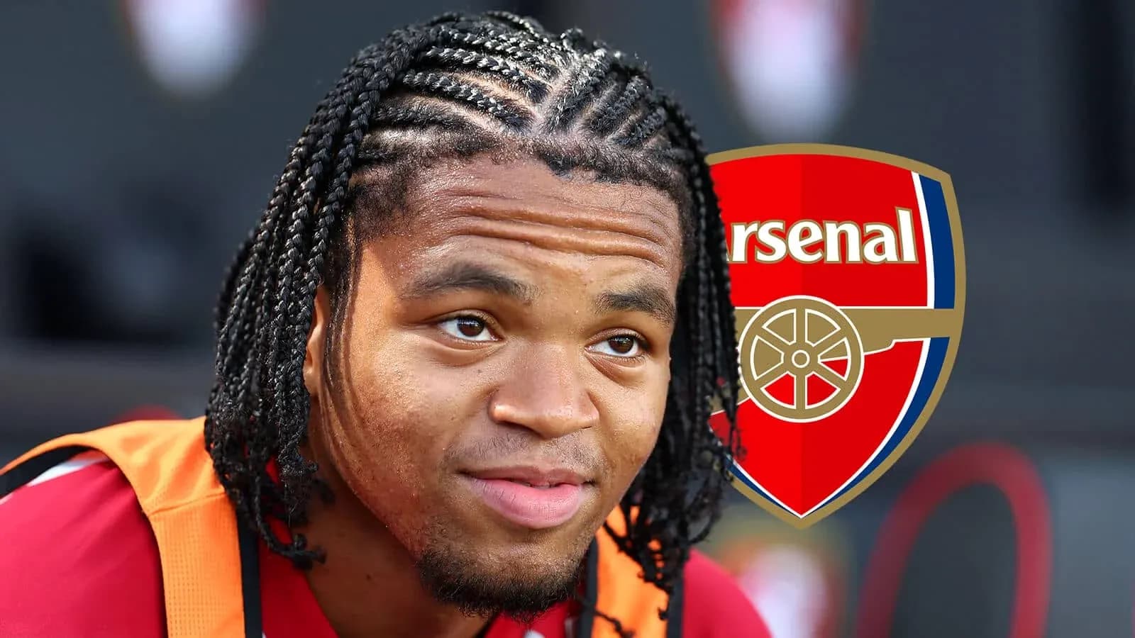 Player with braided hair next to Arsenal logo
