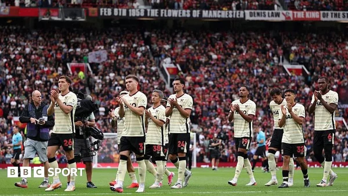 Players applauding fans after a match at stadium