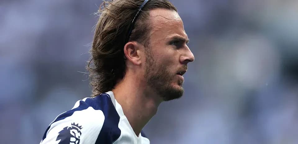 Player in Tottenham jersey during match action