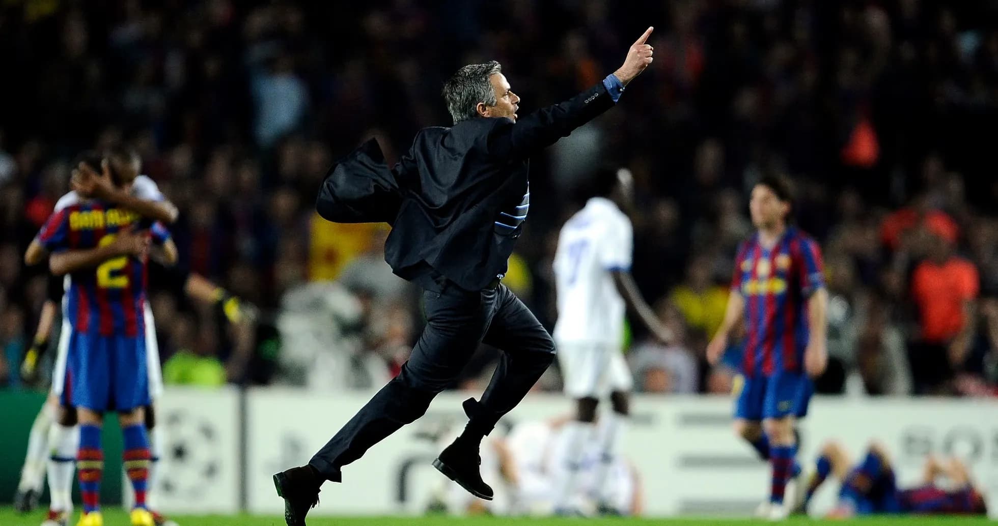 Manager celebrating a goal during a match