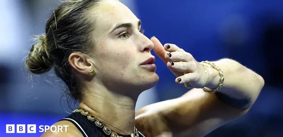 Tennis player gesturing during a match