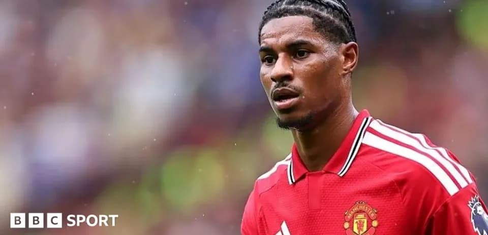 Player in Manchester United jersey on the field