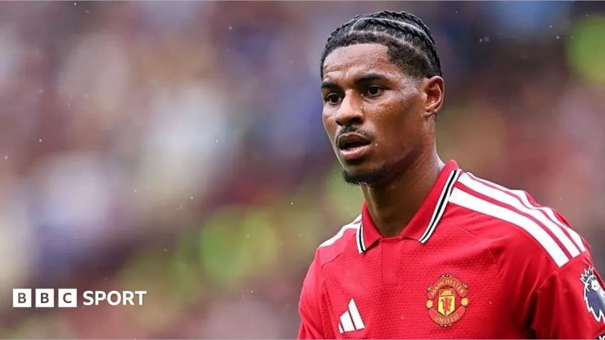 Player in Manchester United jersey on the field