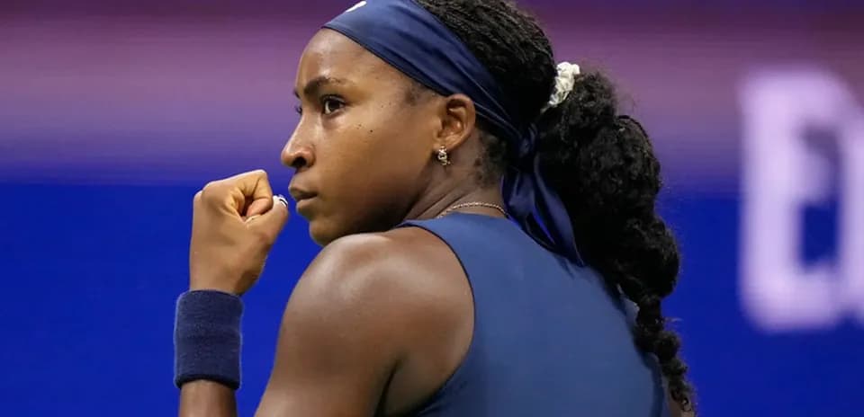 Coco Gauff celebrating during a tennis match