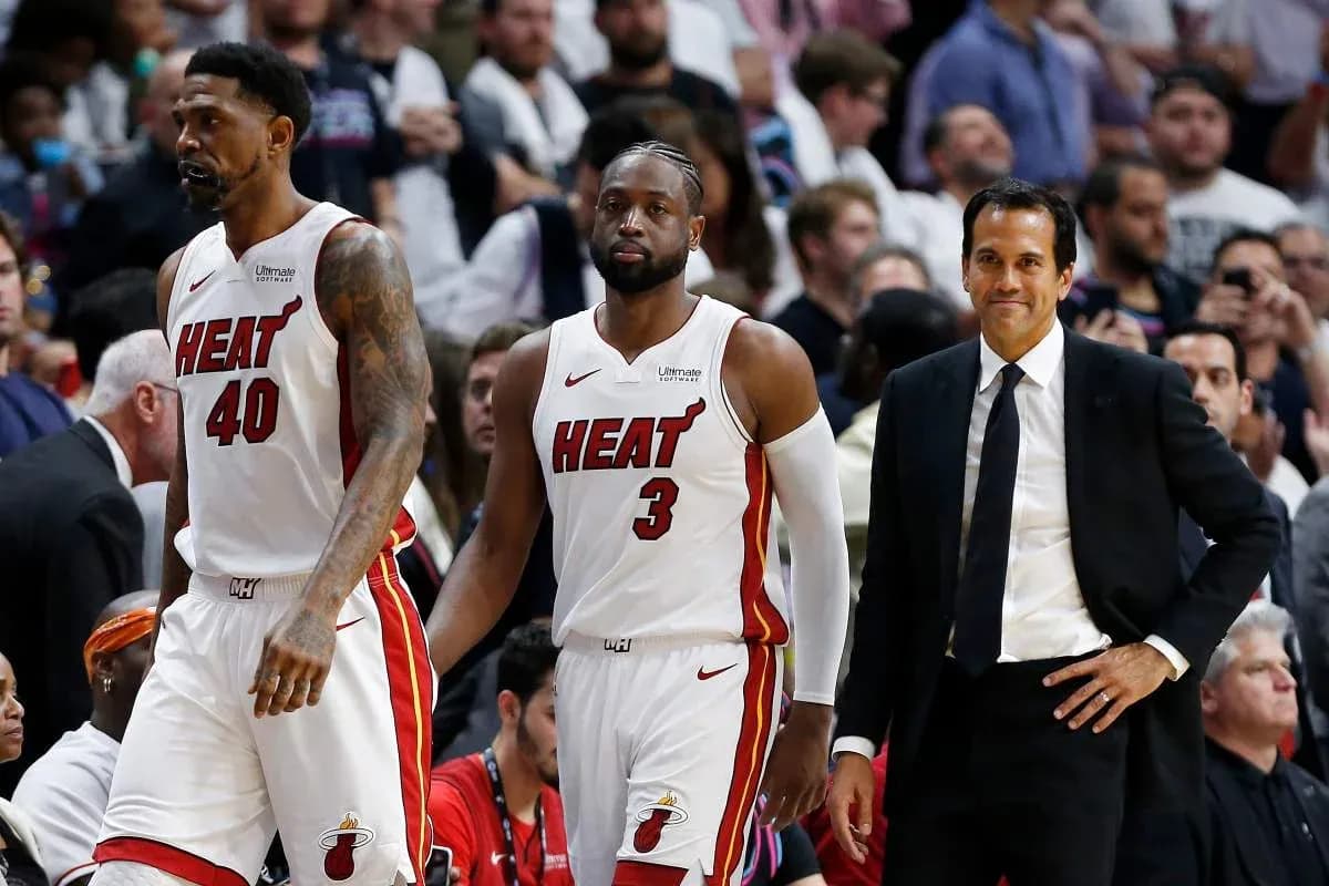 Miami Heat players and coach during game timeout