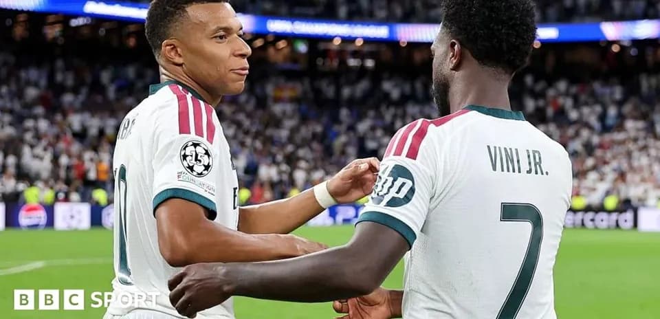 Mbappé and Vini Jr. celebrating during a match