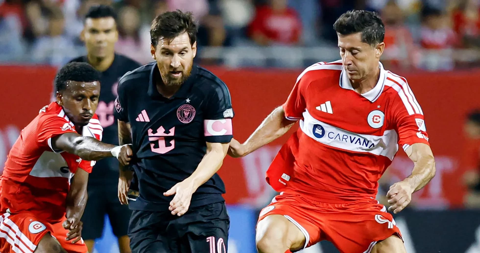 Players competing for the ball during soccer match