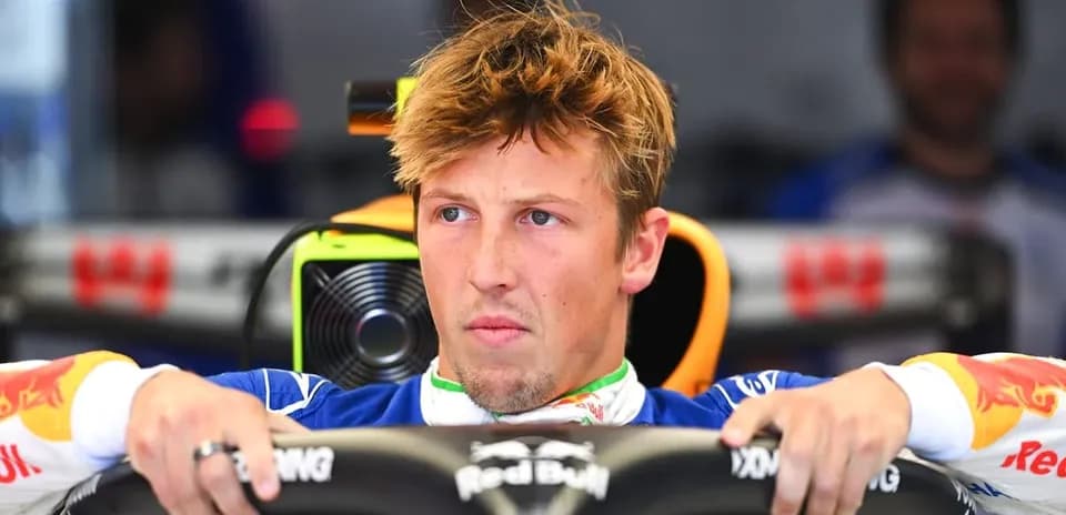 Driver focusing in cockpit of Formula 1 car