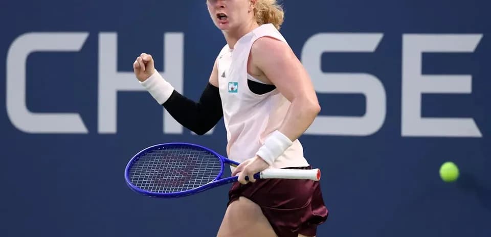 Tennis player celebrating during a match