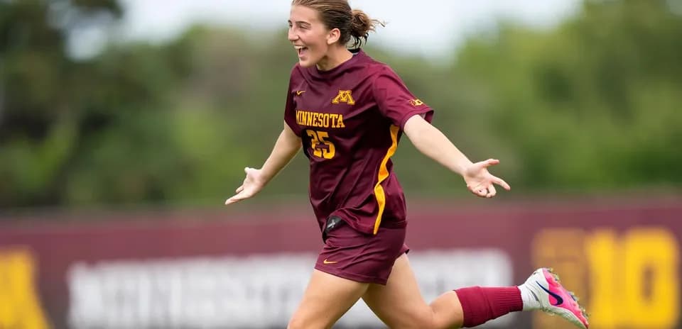 Player celebrating after scoring a goal for Minnesota