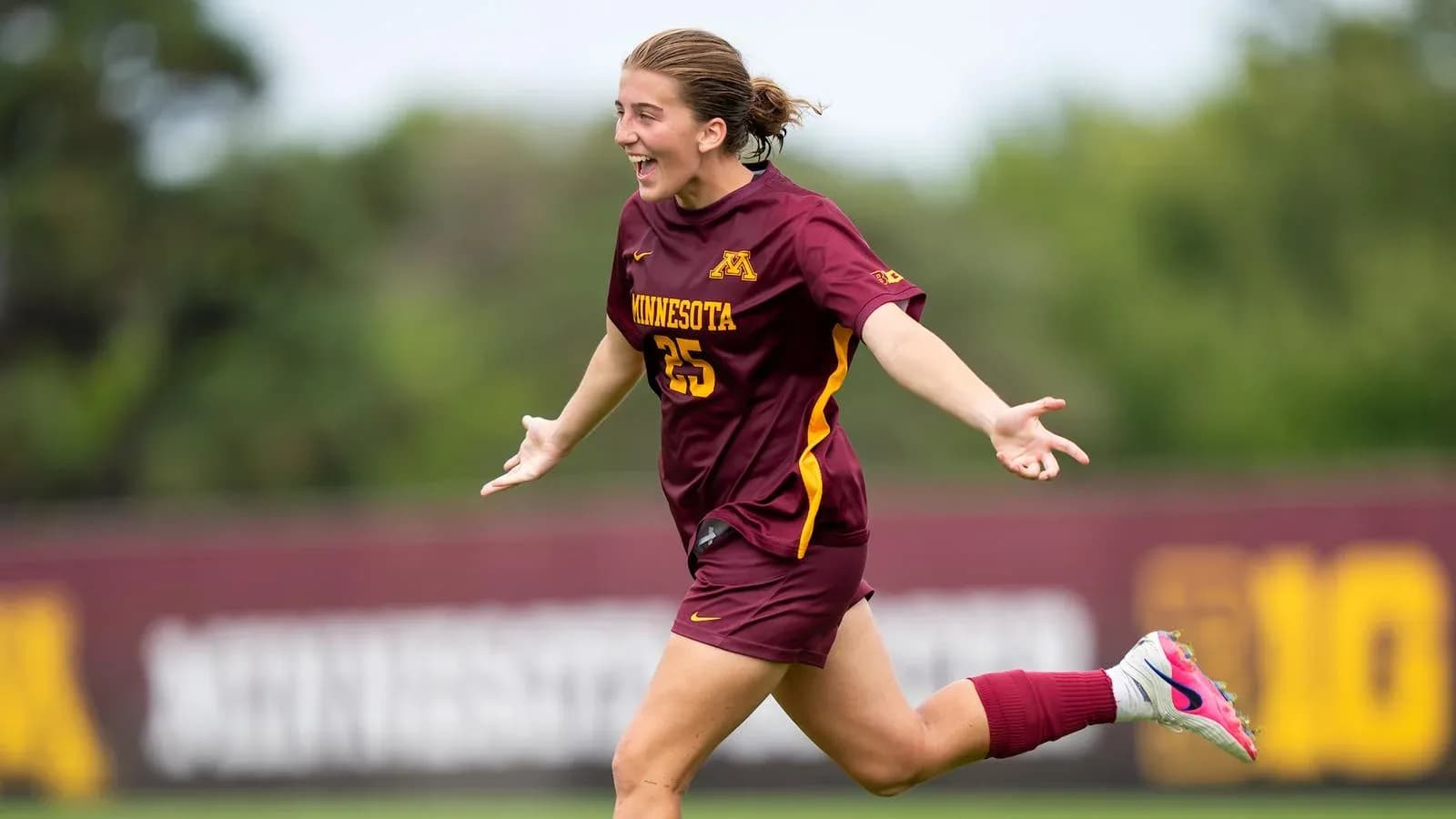 Player celebrating after scoring a goal for Minnesota
