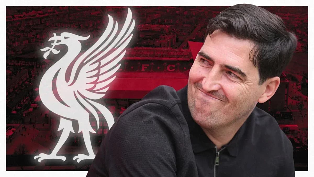 Man smiling with Liverpool FC logo background