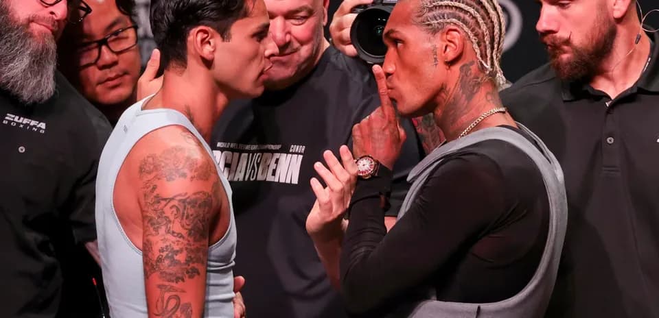 Two boxers face-off during weigh-in event