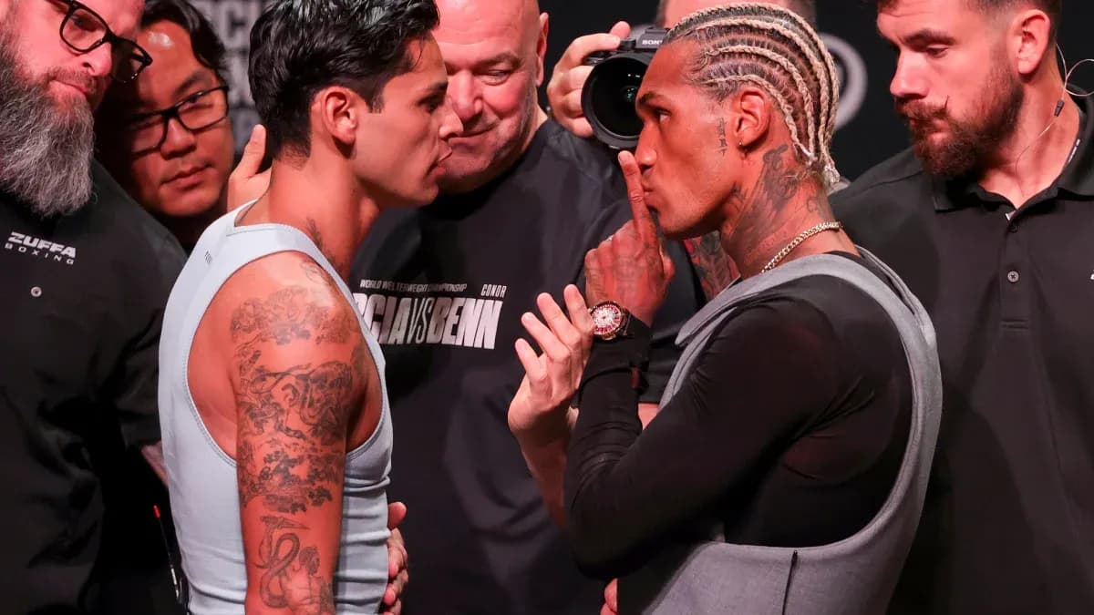 Two boxers face-off during weigh-in event