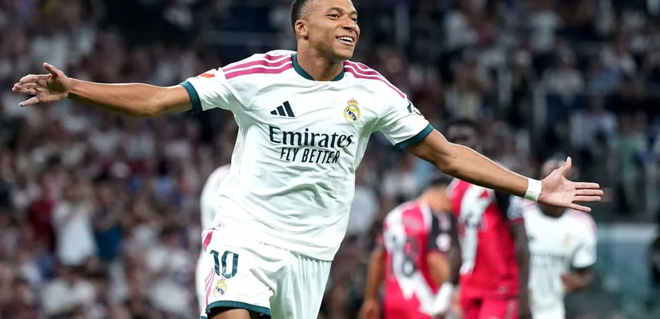 Player celebrating after scoring a goal for Real Madrid