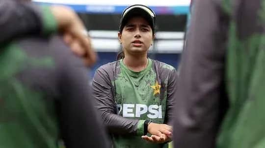 Player discussing strategy during team training session