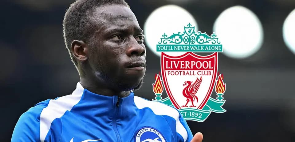 Brighton player in jersey with Liverpool logo background