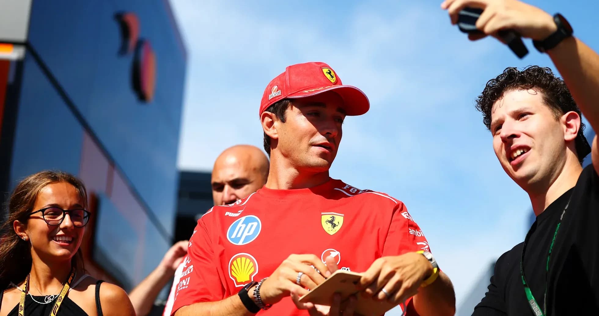 Driver interacting with fans at an event