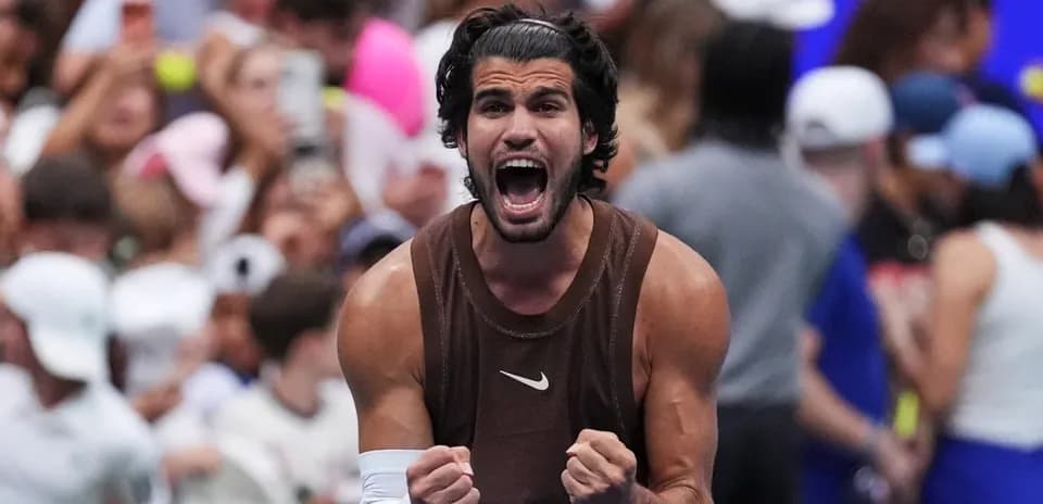 Player celebrating with fists clenched after victory