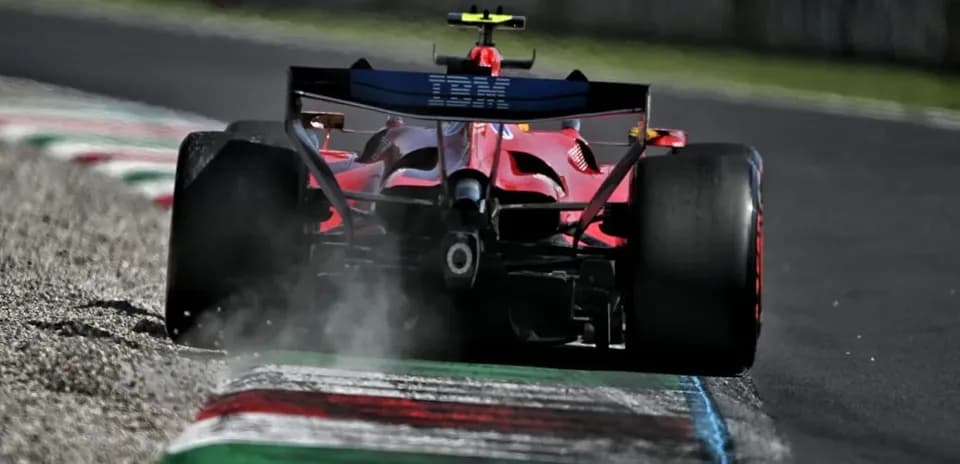 Ferrari car skidding on track with smoke