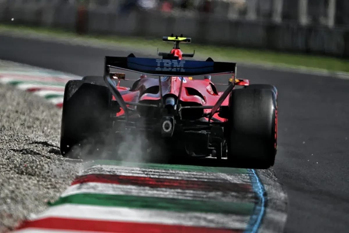 Ferrari car skidding on track with smoke
