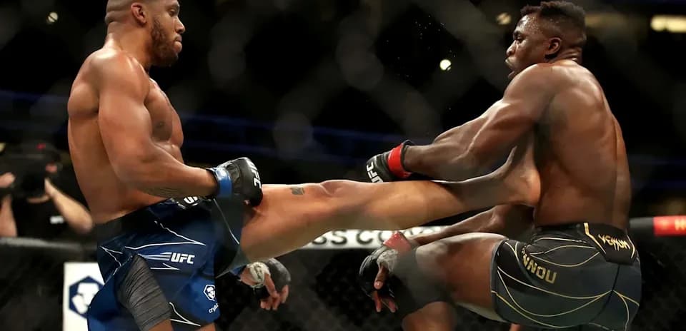 Two fighters exchanging strikes in UFC match
