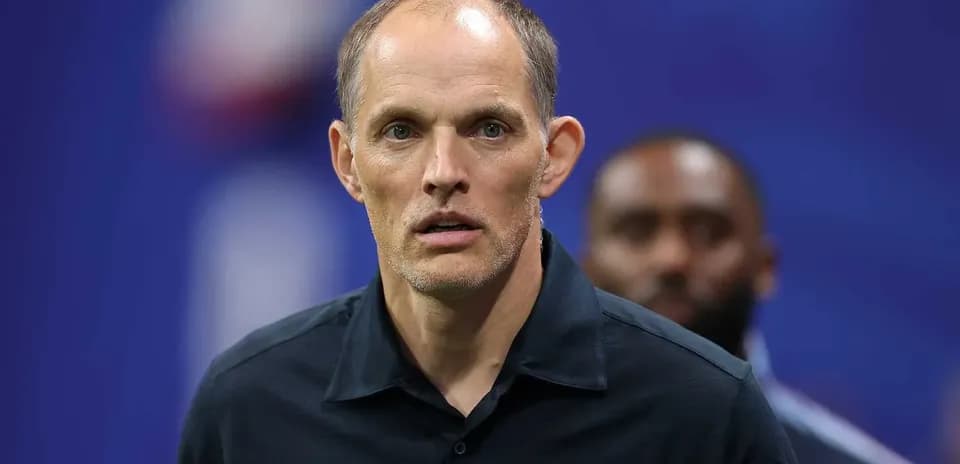 Coach looking focused during match preparation