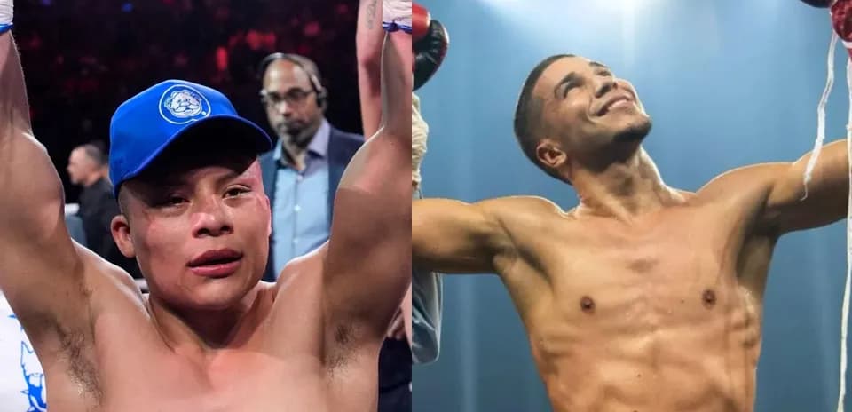Two boxers celebrating victory in the ring