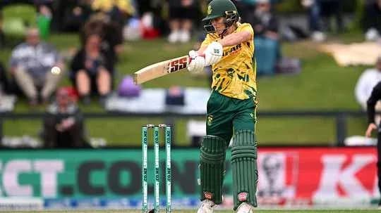 Batter playing a shot in cricket match