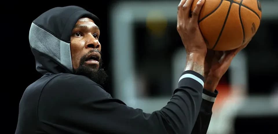 Player shooting a basketball during practice session