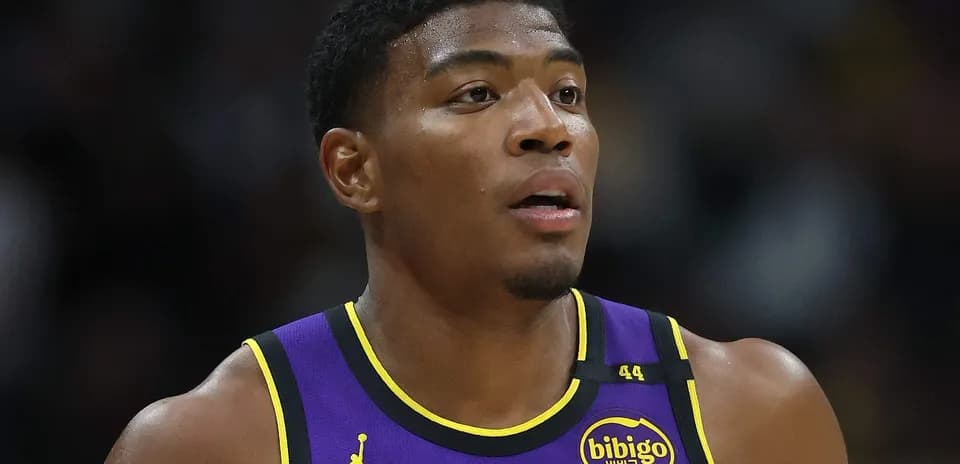 Player in Lakers jersey during game action