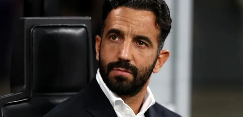 Coach sitting on the bench during a match