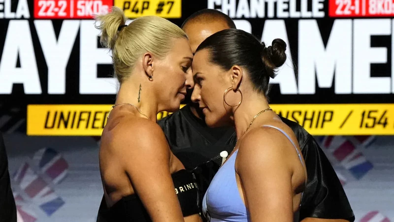 Two boxers facing off before championship match