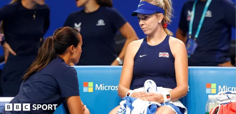 Player receiving coaching during a tennis match