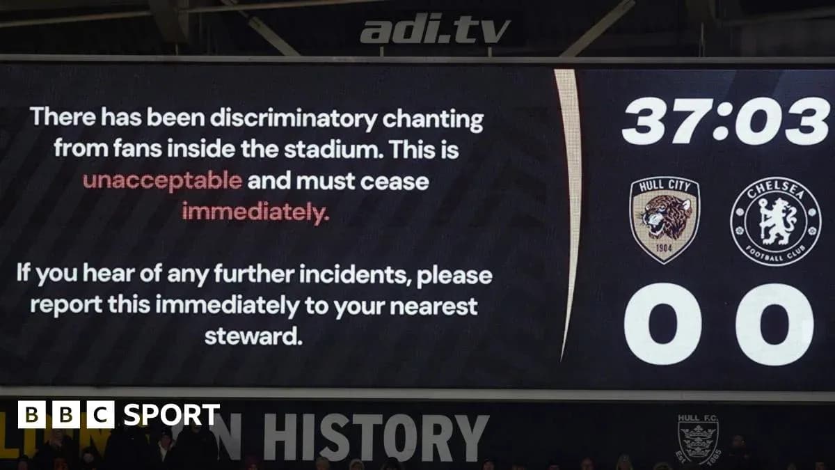 Stadium screen displaying message about discriminatory chanting