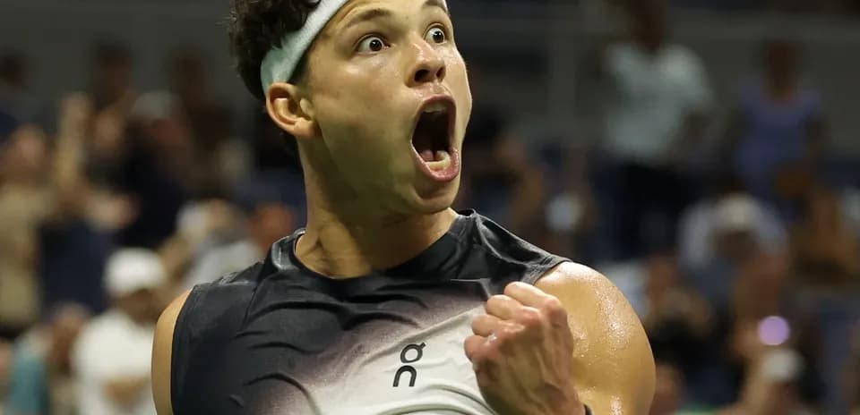 Tennis player celebrating during a match