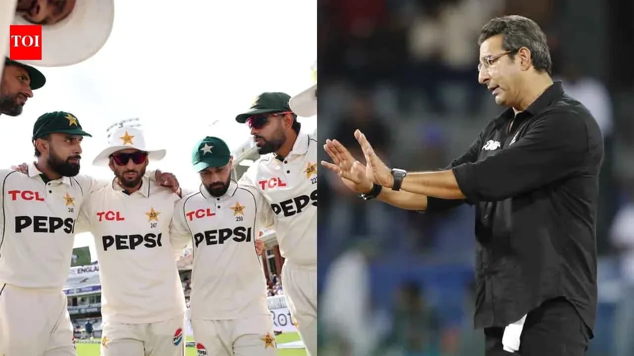 Pakistani cricket team huddled; coach giving instructions